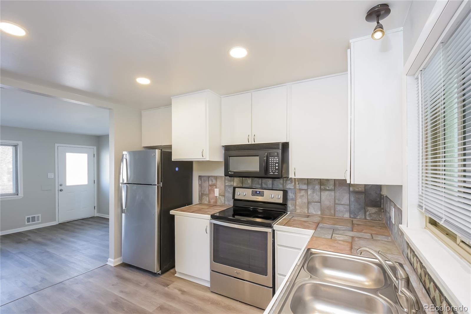 1344 Elmer Drive Northglenn, CO 80233 - Photo 6 of 17