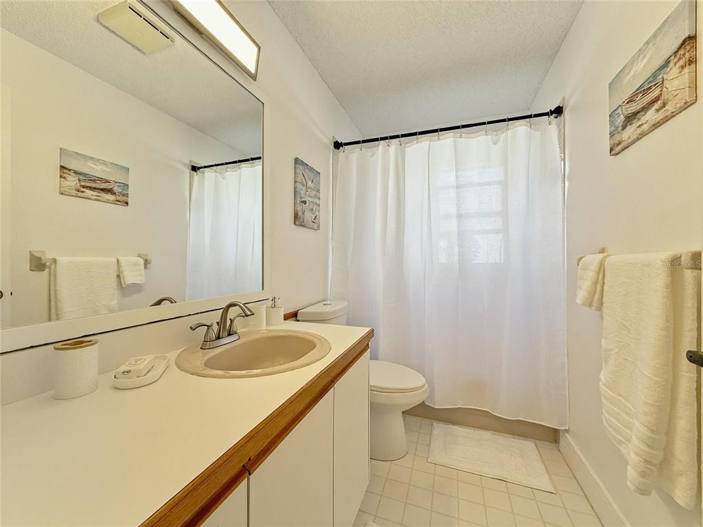 2436 Deer Trail Lane Spring Hill, FL 34606 - Photo 20 of 56 a bathroom with a sink toilet and shower