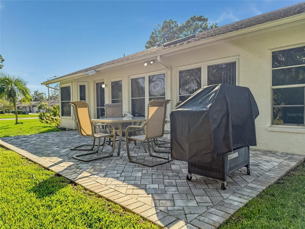 2436 Deer Trail Lane Spring Hill, FL 34606 - Photo 21 of 56 a view of a house with backyard and sitting area