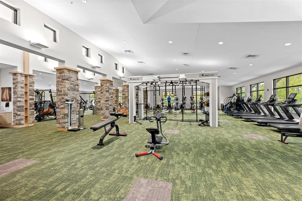 2436 Deer Trail Lane Spring Hill, FL 34606 - Photo 42 of 56 a view of a room with gym equipment