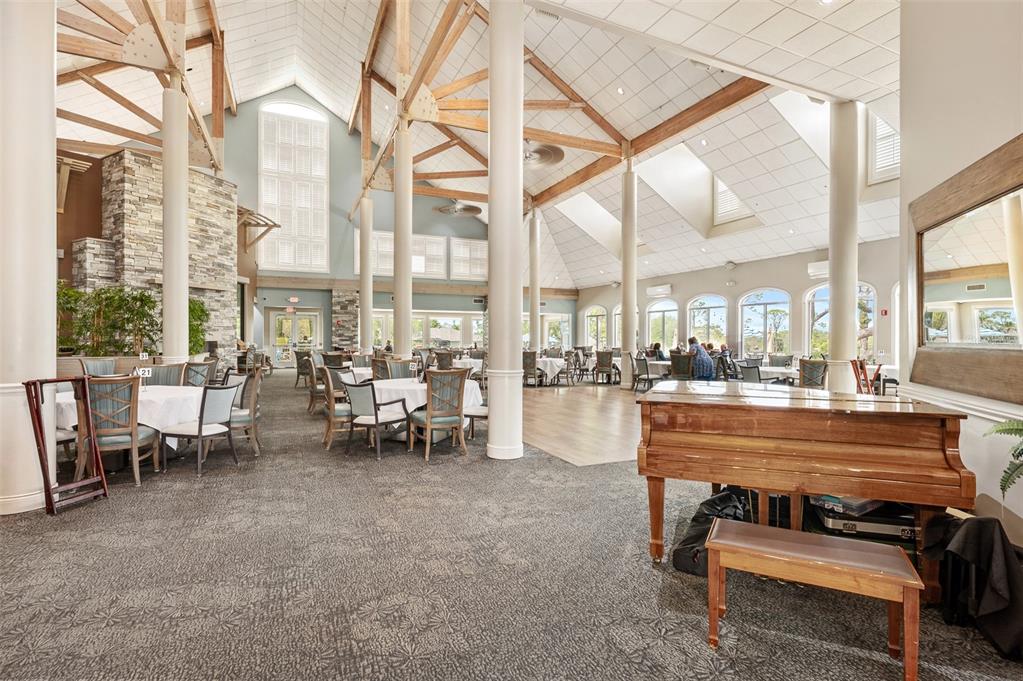 2436 Deer Trail Lane Spring Hill, FL 34606 - Photo 53 of 56 a view of living room with furniture and floor to ceiling windows