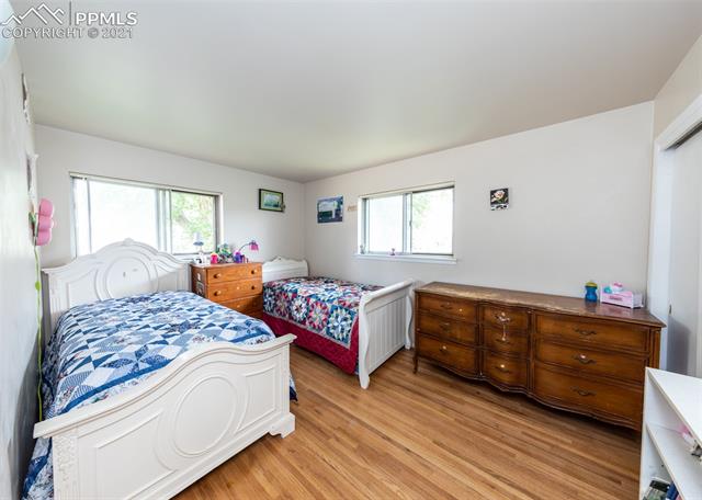 2208 North Chelton Road Colorado Springs, CO 80909 - Photo 15 of 24 Second bedroom on main level