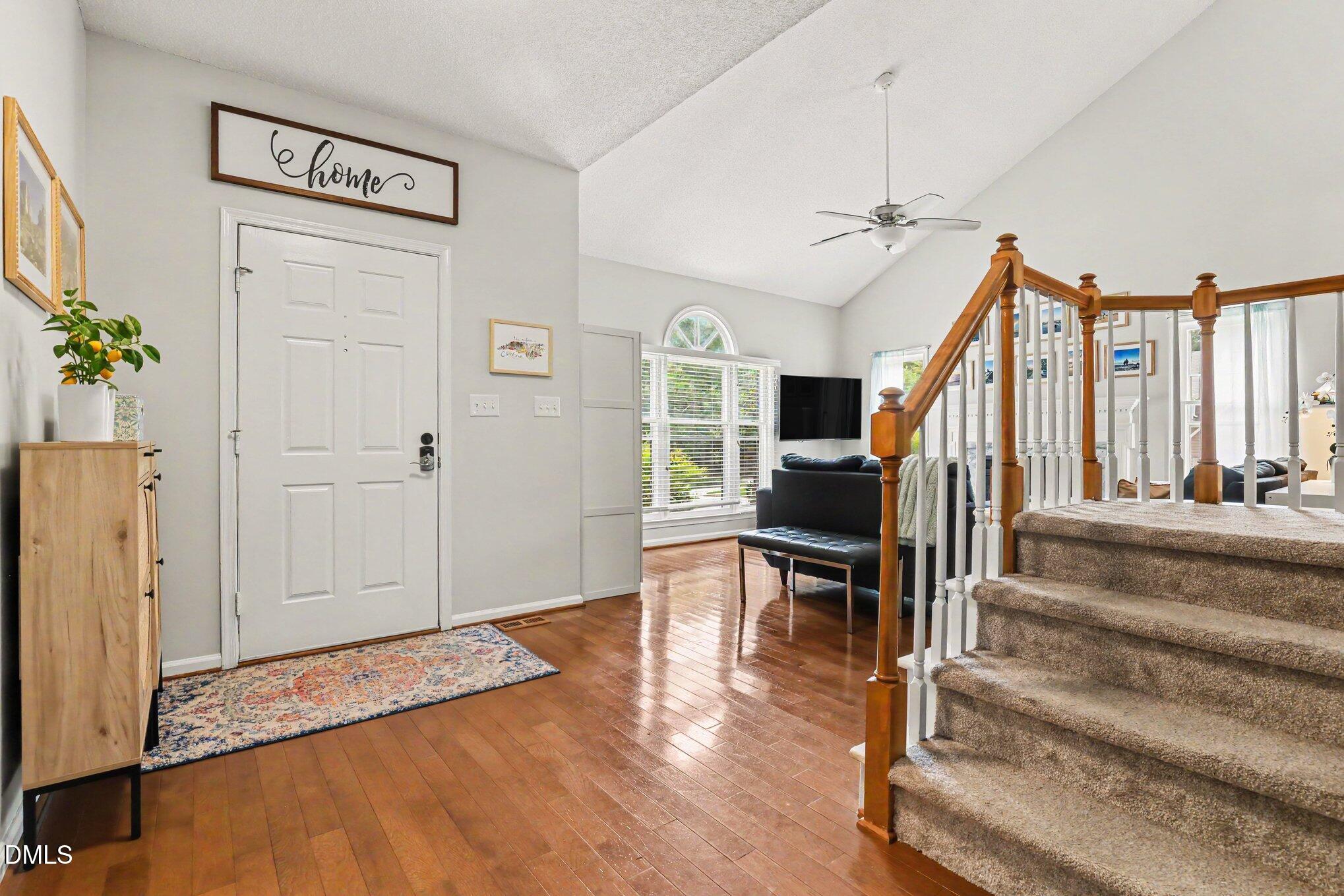 5468 Ingate Way Raleigh, NC 27613 - Photo 2 of 24 a view of a livingroom with wooden floor and furniture