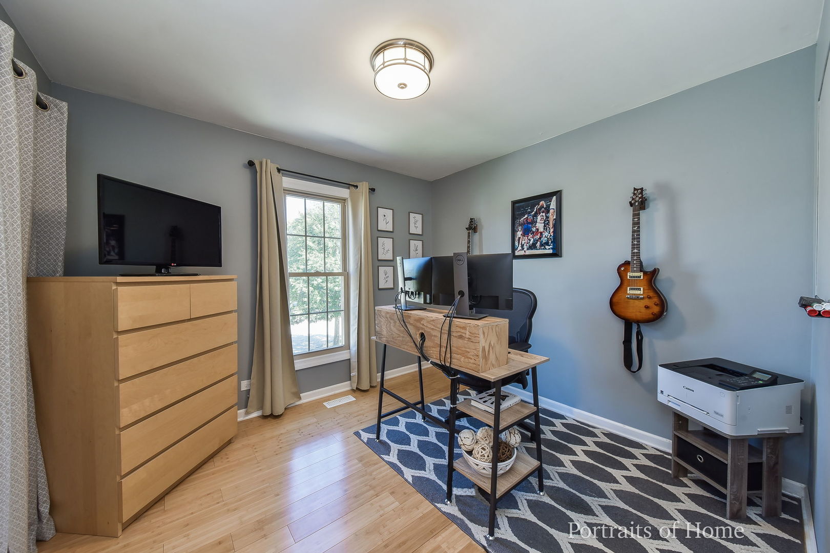 119 Reston Court Roselle, IL 60172 - Photo 12 of 25 a workspace with furniture window and wooden floor