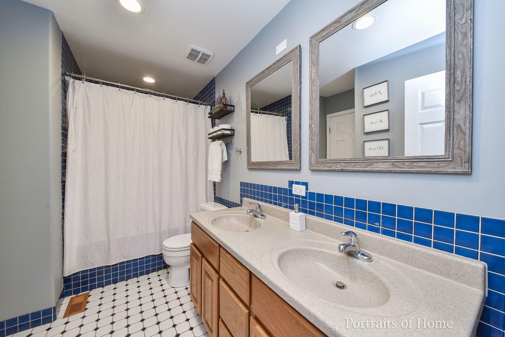 119 Reston Court Roselle, IL 60172 - Photo 13 of 25 a bathroom with a sink and a mirror