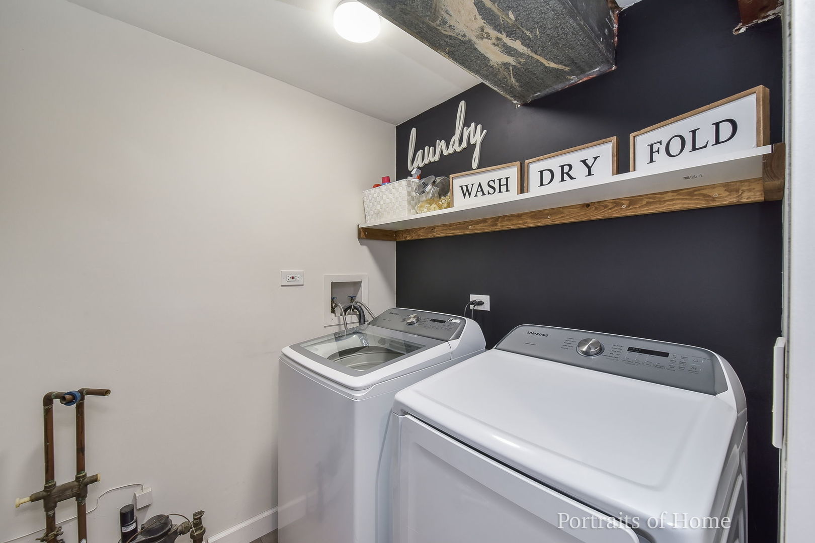 119 Reston Court Roselle, IL 60172 - Photo 18 of 25 a utility room with dryer and washer