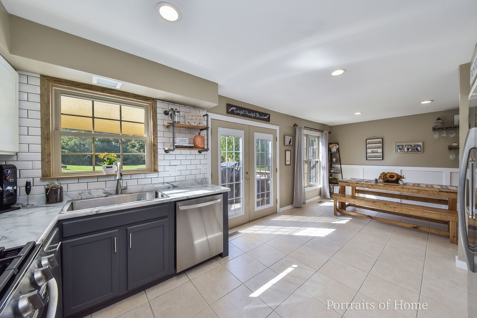 119 Reston Court Roselle, IL 60172 - Photo 7 of 25 a large kitchen with a large counter top and sink