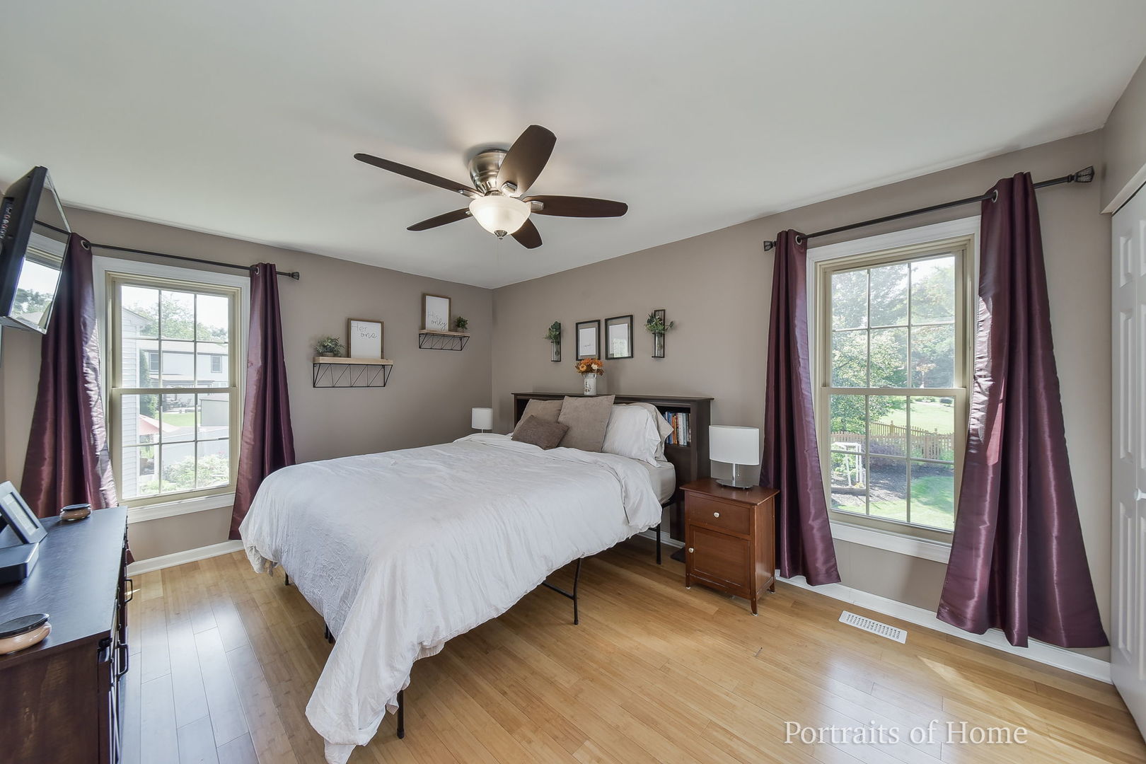 119 Reston Court Roselle, IL 60172 - Photo 10 of 25 a bedroom with a large bed and a large window