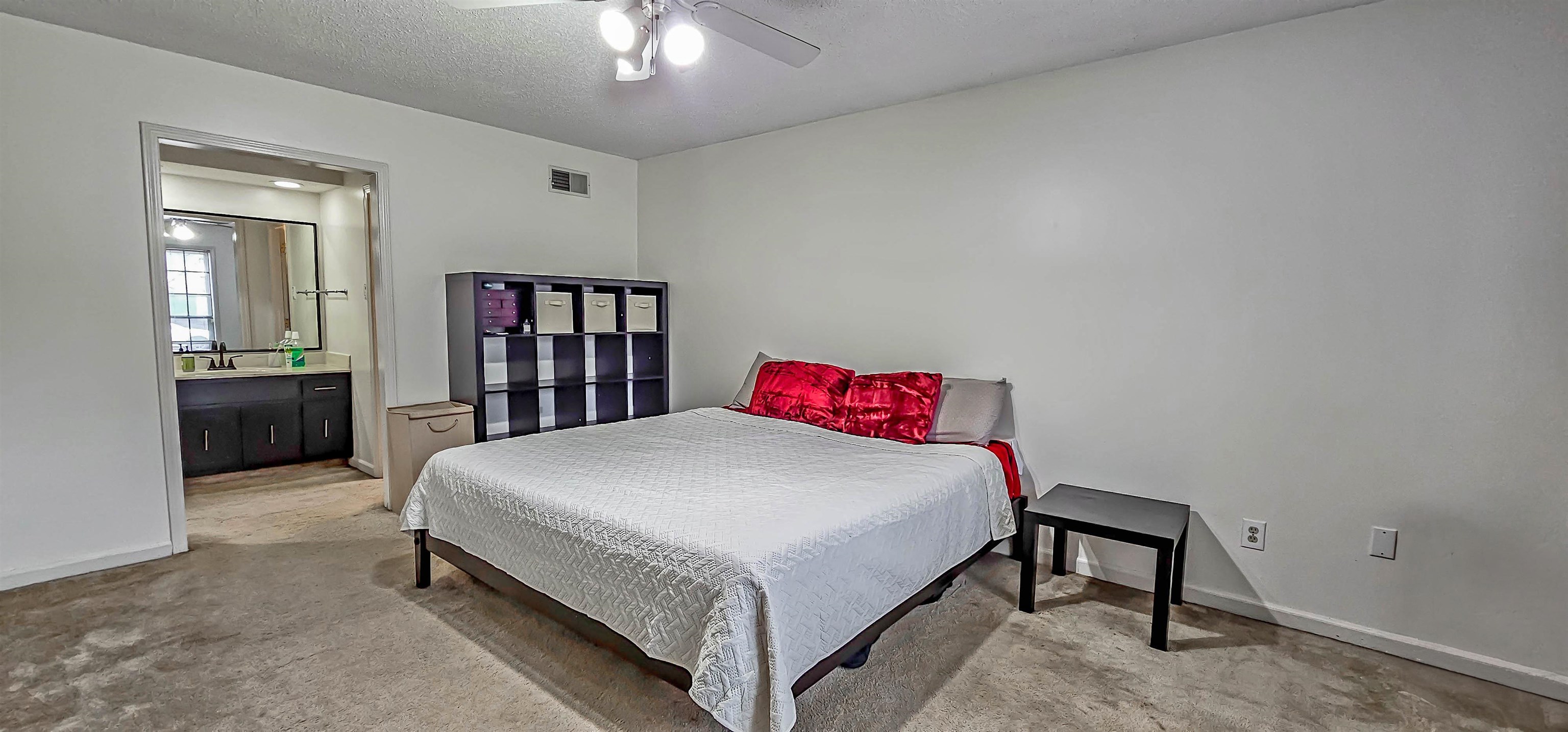 3204 Ruskin Road Memphis, TN 38134 - Photo 13 of 24 a bedroom with a bed and a table