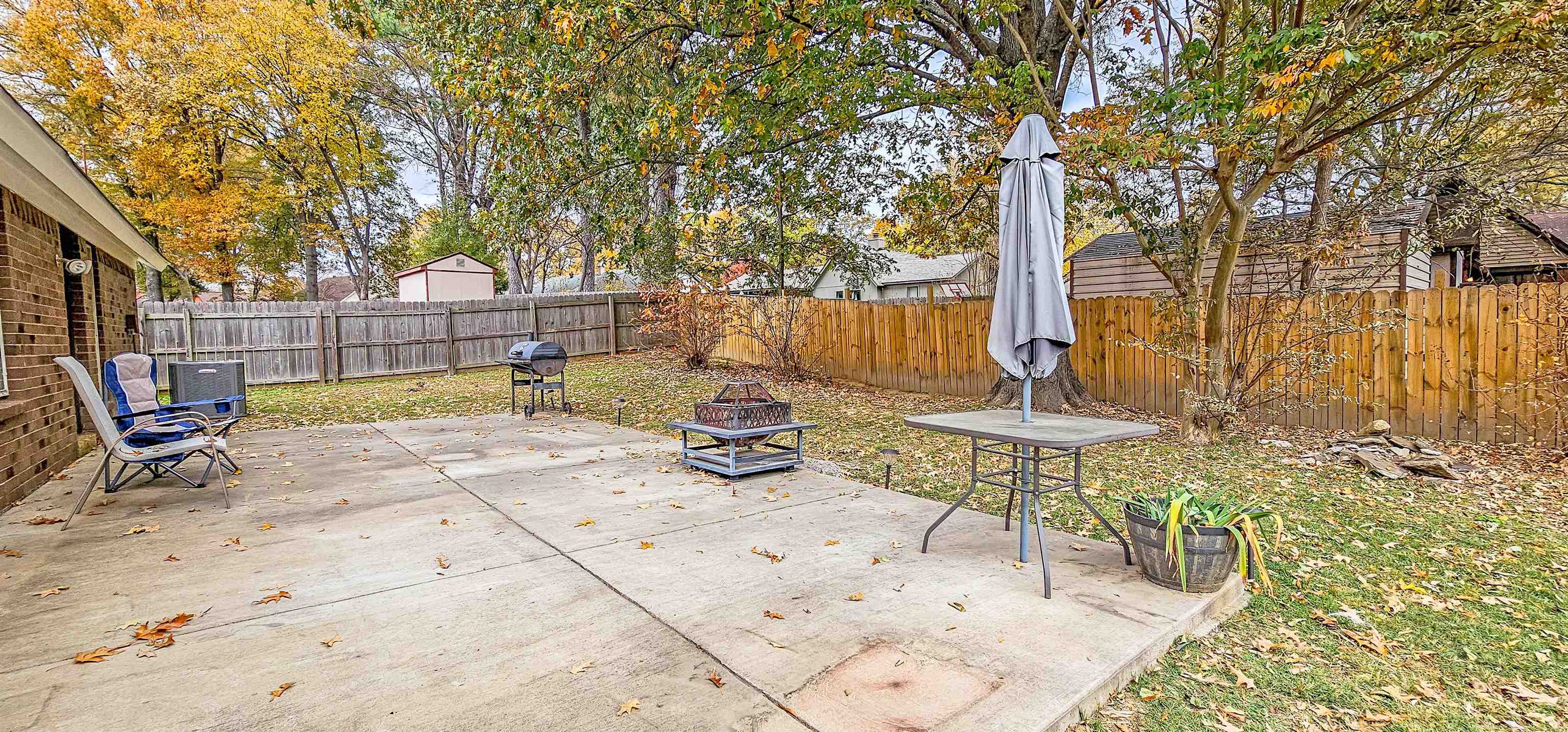3204 Ruskin Road Memphis, TN 38134 - Photo 21 of 24 a view of backyard with a table and chairs