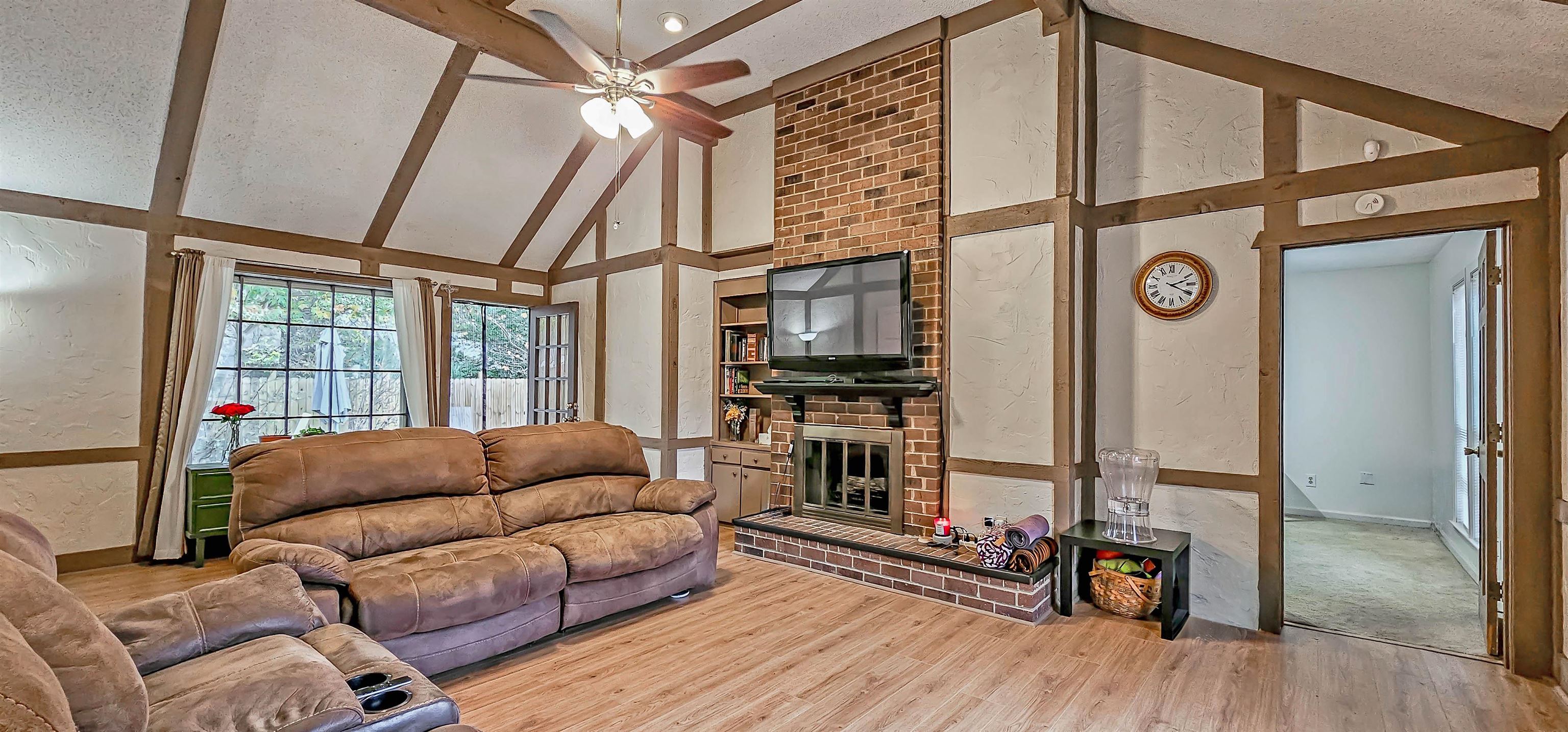 3204 Ruskin Road Memphis, TN 38134 - Photo 5 of 24 a living room with furniture a ceiling fan and a window