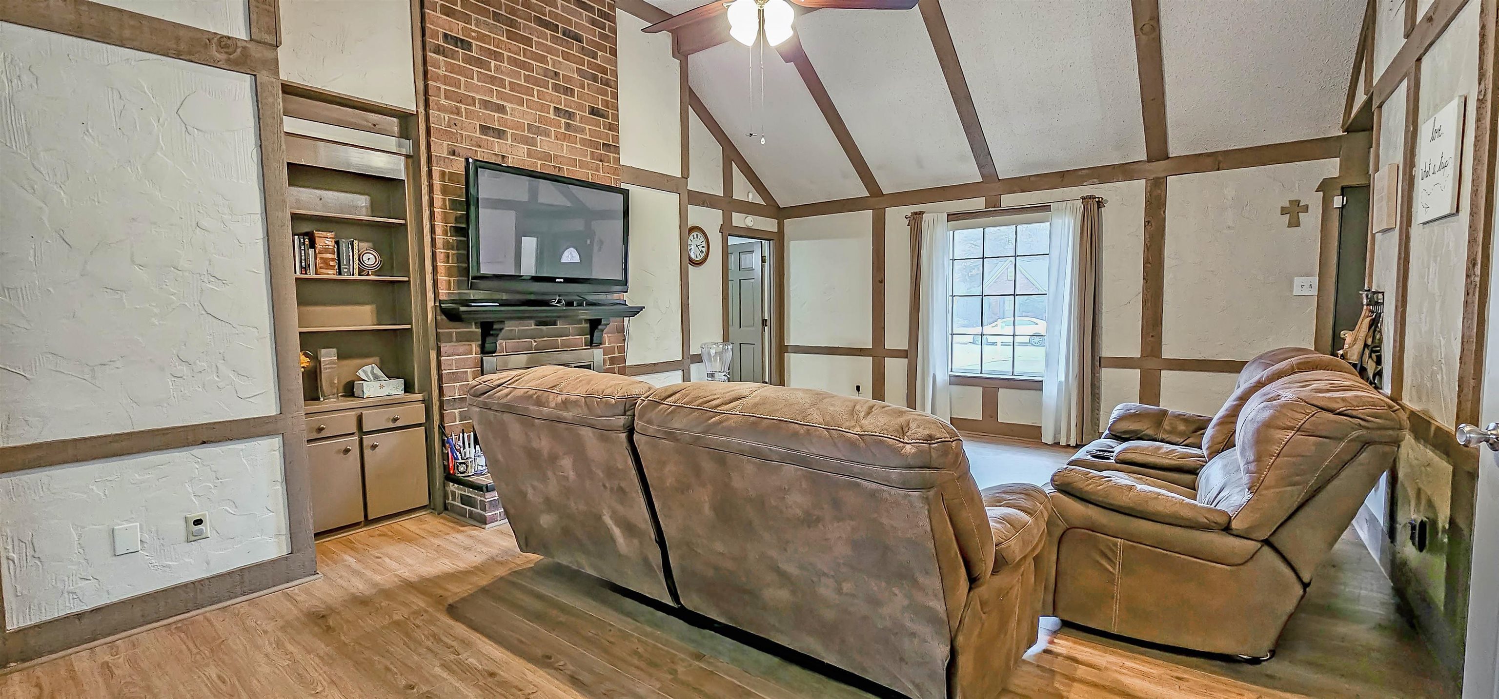 3204 Ruskin Road Memphis, TN 38134 - Photo 6 of 24 a living room with furniture and a floor to ceiling window