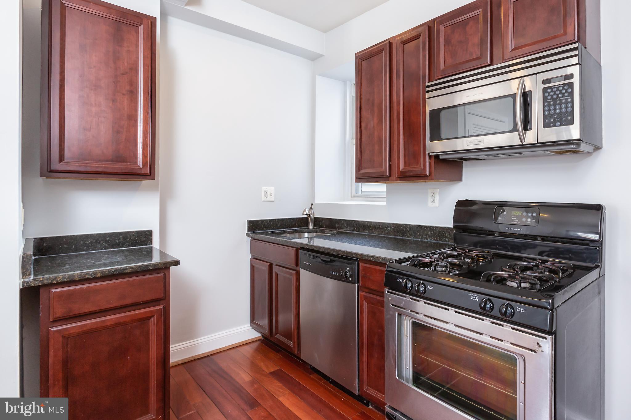 424 Ridge Street Northwest, Unit 5 Washington, DC 20001 - Photo 7 of 18 Kitchen with stainless steel appliances