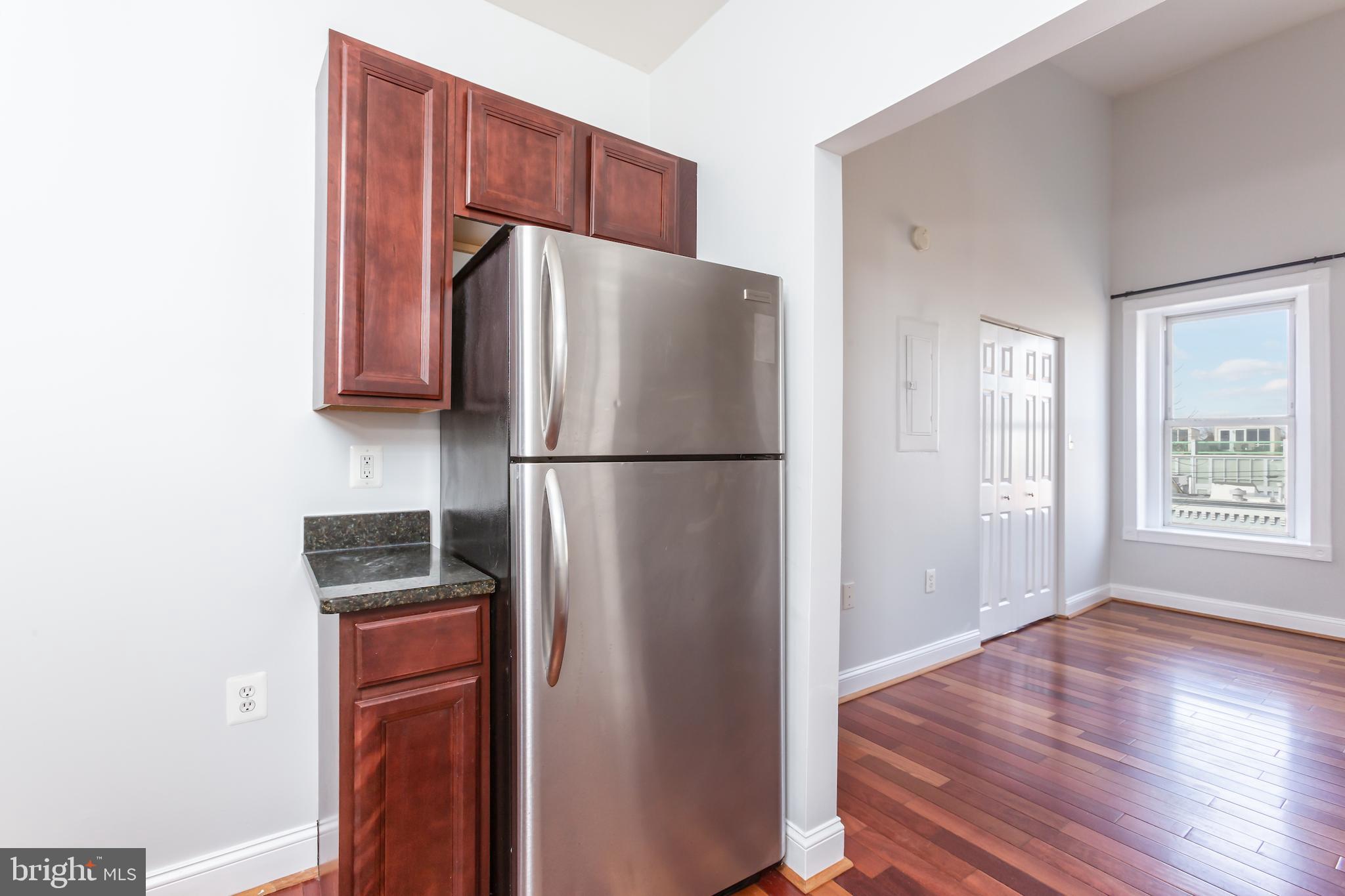 424 Ridge Street Northwest, Unit 5 Washington, DC 20001 - Photo 8 of 18 Kitchen with stainless steel appliances