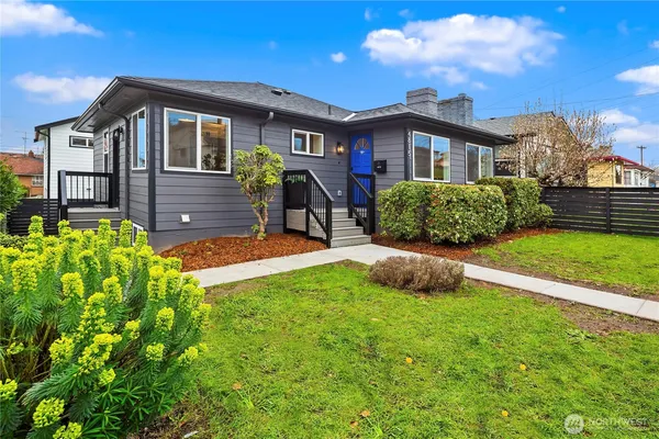 front view of a house with a yard