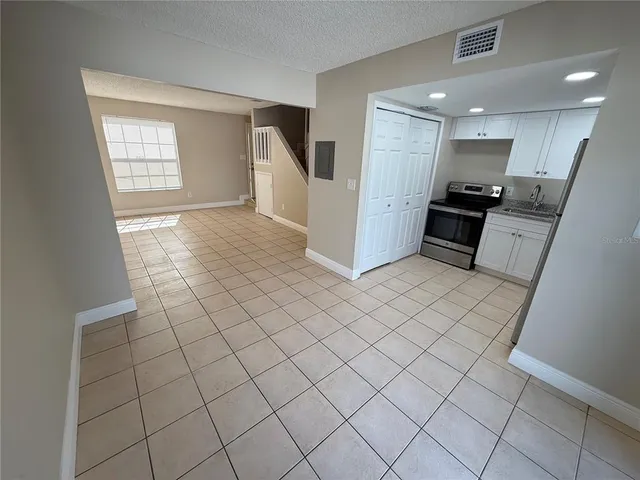 a view of kitchen with windows