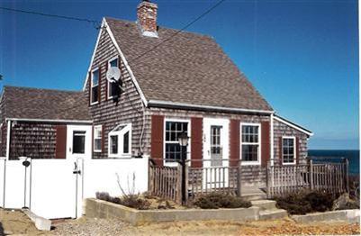 a front view of a house with a porch