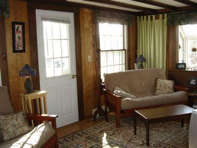 284 Ocean View Drive Wellfleet, MA 02667 - Photo 11 of 34 a living room with furniture and a window