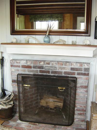 284 Ocean View Drive Wellfleet, MA 02667 - Photo 25 of 34 a stove top oven sitting inside of a kitchen