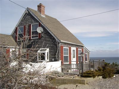 284 Ocean View Drive Wellfleet, MA 02667 - Photo 27 of 34 a view of a house with a yard