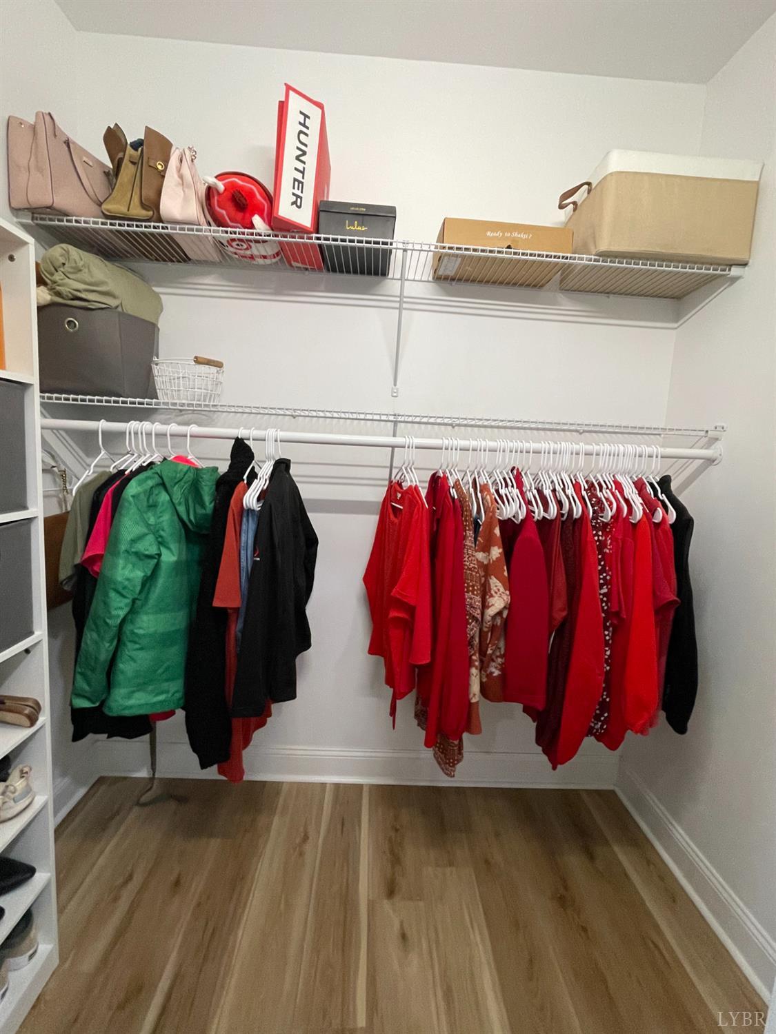 708 Grove Street Bedford, VA 24523 - Photo 9 of 22 a view of walk in closet with clothes and shoes
