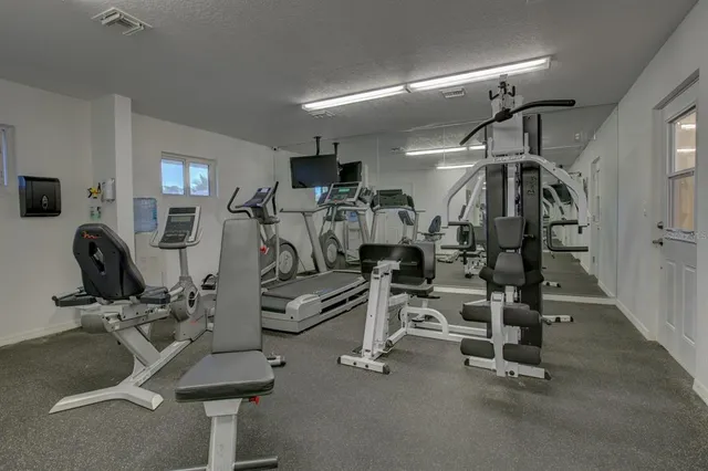 a view of a room with gym equipment