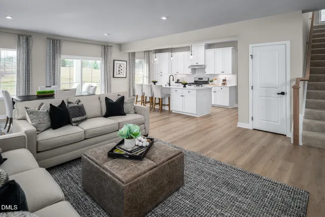a living room with furniture and a couch