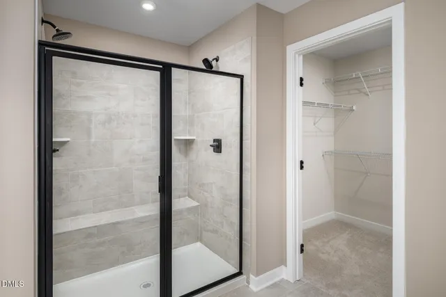 a bathroom with a granite countertop sink mirror and a