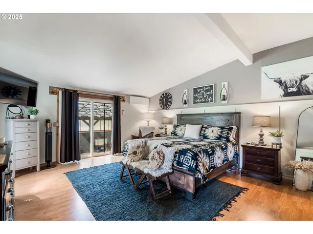 a bed room with bed and a window