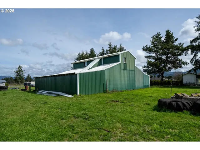 a backyard of a house with lots of green space
