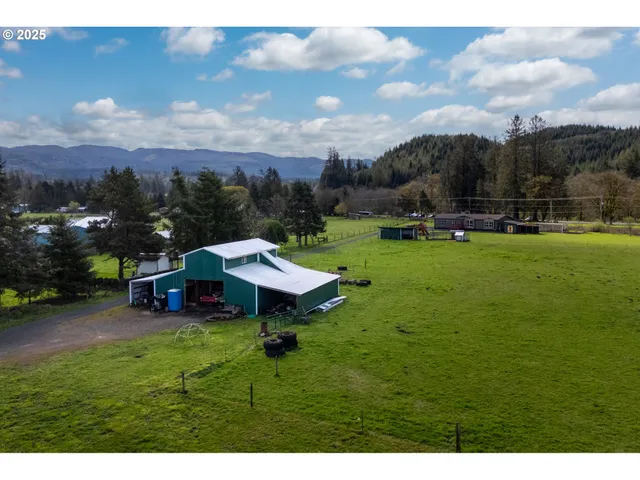 a view of a garden with an outdoor space and deck