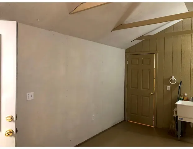 a kitchen with a stove and a refrigerator