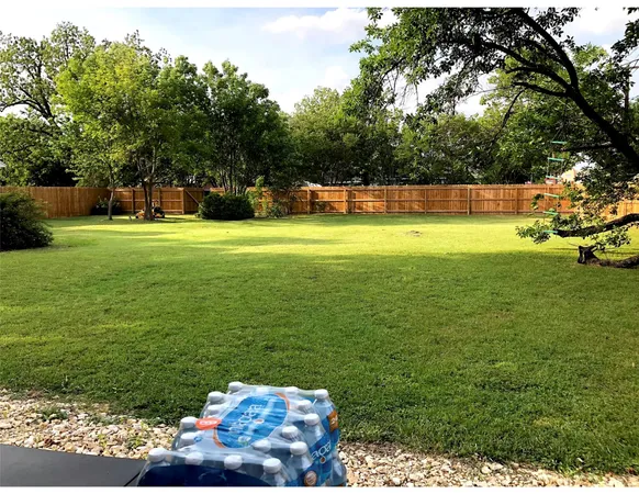 a view of a golf course with a garden