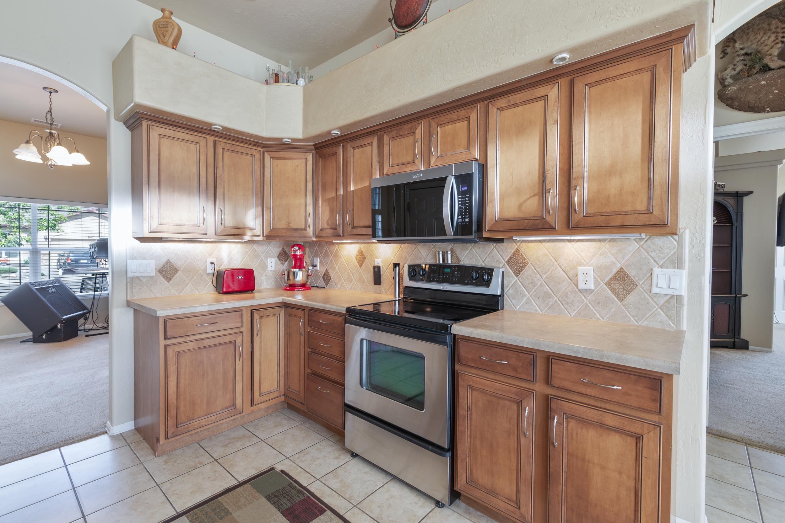544 Hemlock Drive Fruita, CO 81521 - Photo 10 of 36 a kitchen with a sink cabinets and appliances