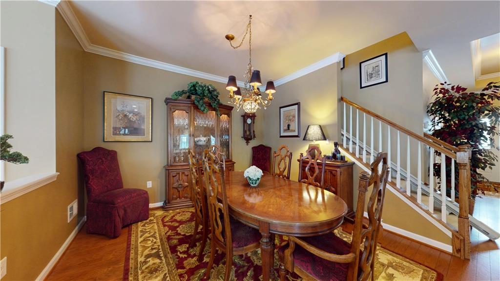527 Pioneer Lane Freedom, PA 15042 - Photo 13 of 39 a view of a dining room with furniture and chandelier