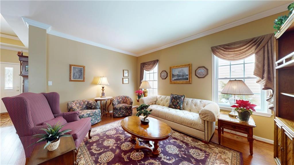 527 Pioneer Lane Freedom, PA 15042 - Photo 16 of 39 a living room with furniture and a rug
