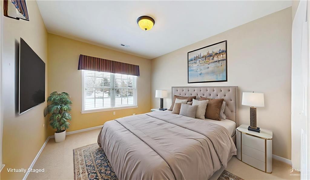 527 Pioneer Lane Freedom, PA 15042 - Photo 21 of 39 a bed sitting in a bedroom next to a window