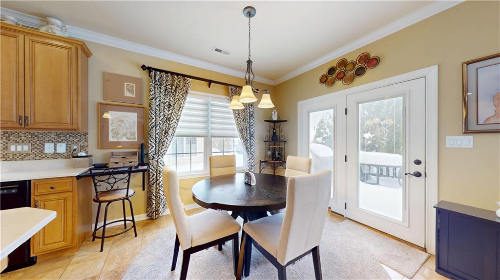 527 Pioneer Lane Freedom, PA 15042 - Photo 8 of 39 a dining room with furniture and window
