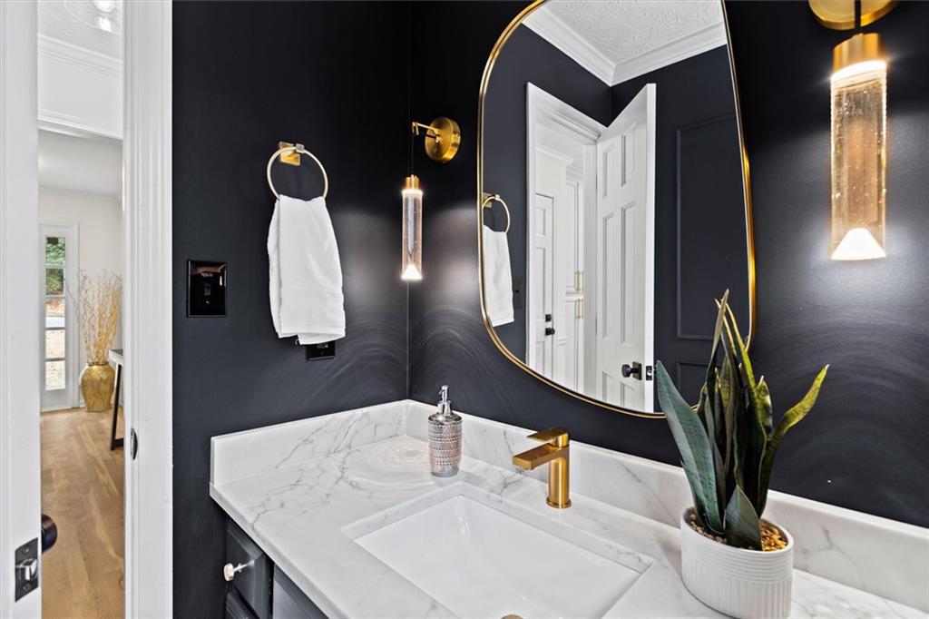 1101 Steeple Run Lawrenceville, GA 30043 - Photo 17 of 70 a bathroom with a sink and a mirror