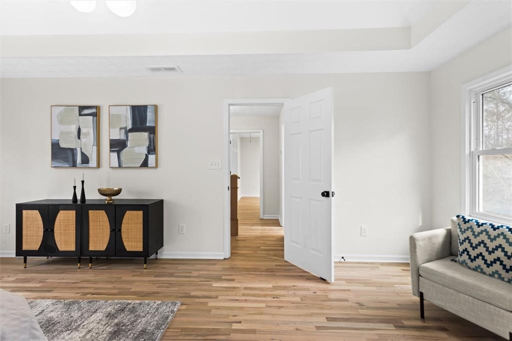1101 Steeple Run Lawrenceville, GA 30043 - Photo 47 of 70 a view of a livingroom with furniture and staircase