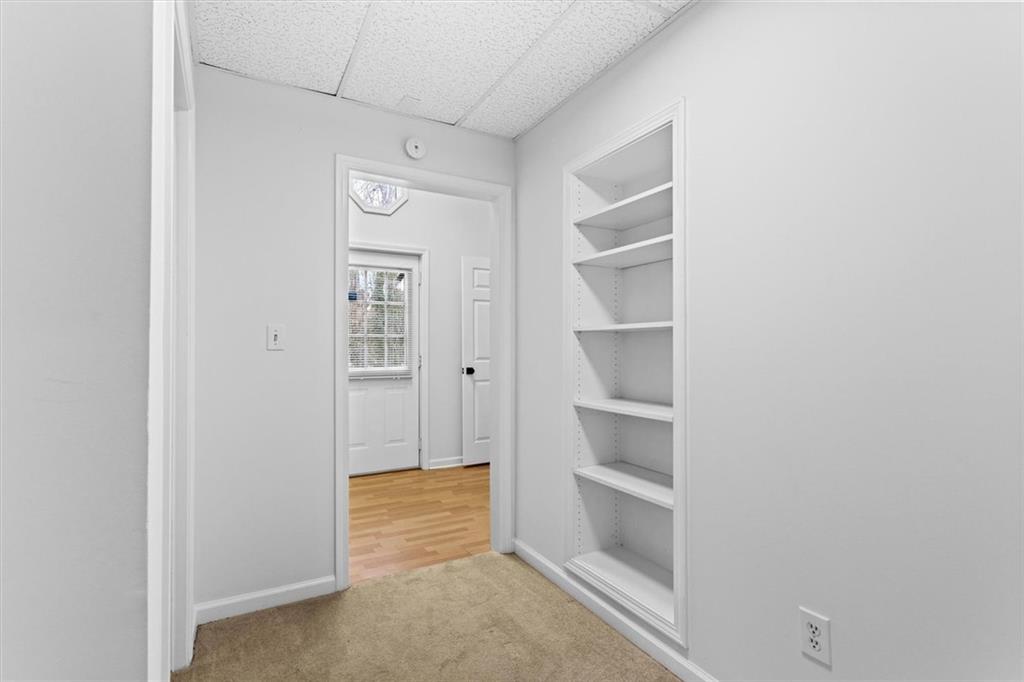 1101 Steeple Run Lawrenceville, GA 30043 - Photo 65 of 70 a view of an empty walk in closet