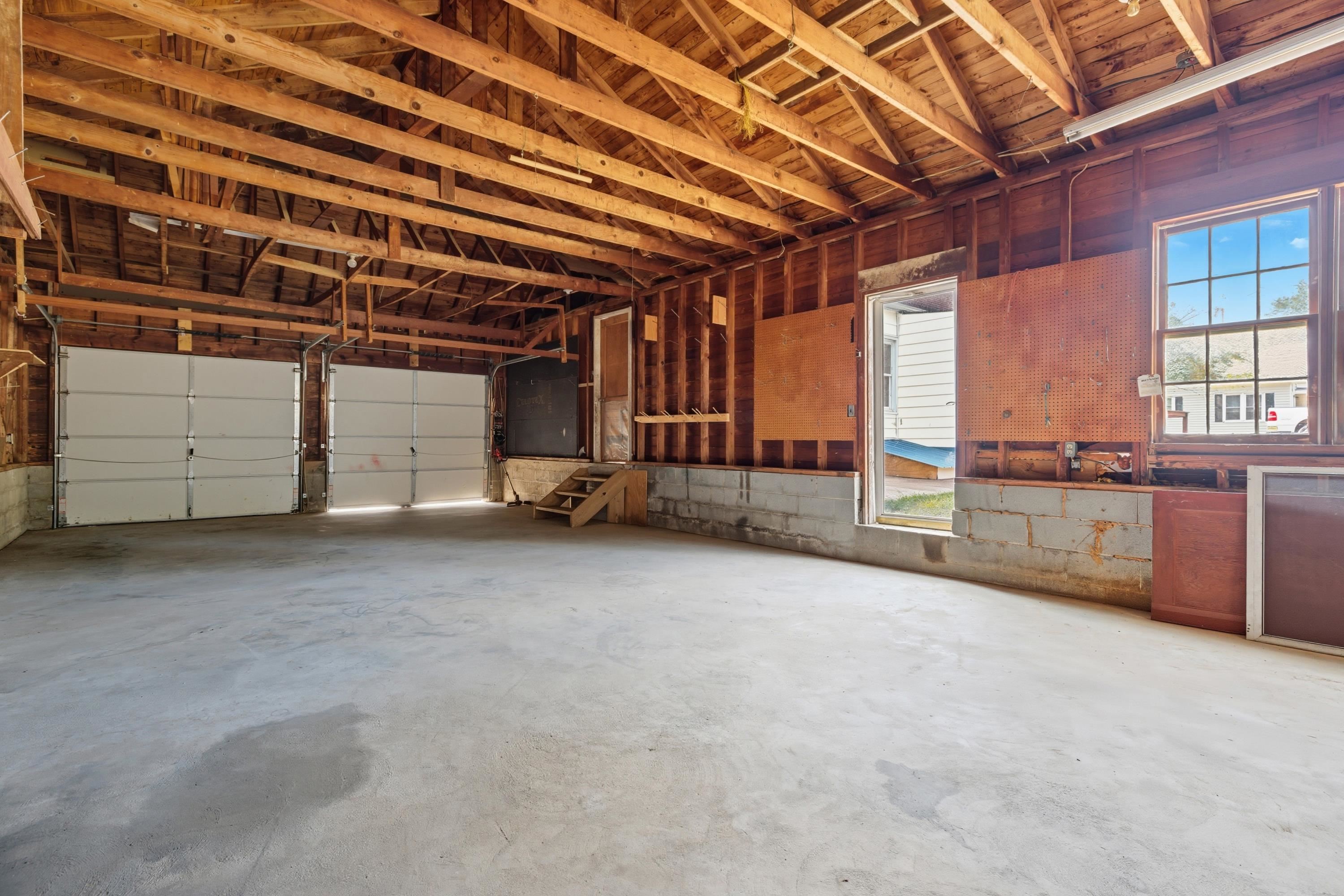 3138 Cross Keys Road Harrisonburg, VA 22801 - Photo 52 of 74 The garage fits 2 cars with additional storage above. This garage is very large and offers space for both vehicles and storage!