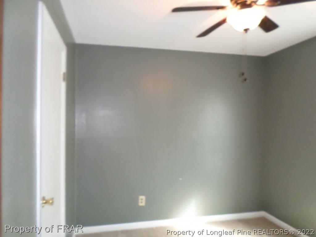 6712 Vaughn Road Fayetteville, NC 28304 - Photo 13 of 19 a view of an empty room