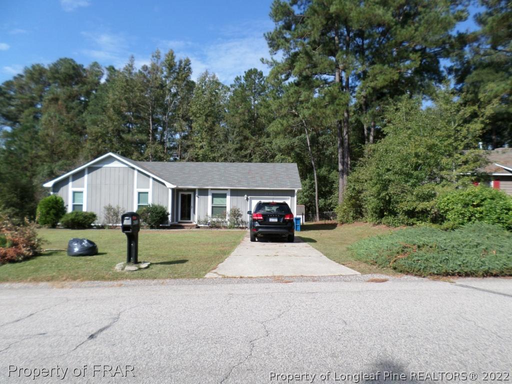 6712 Vaughn Road Fayetteville, NC 28304 - Photo 2 of 19 a house view with a garden space