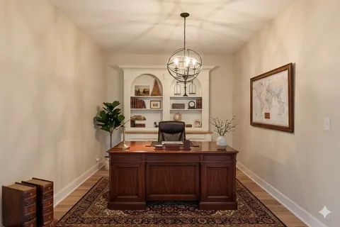 a view of a workspace with furniture