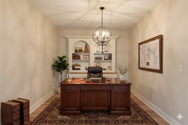 a view of a workspace with furniture