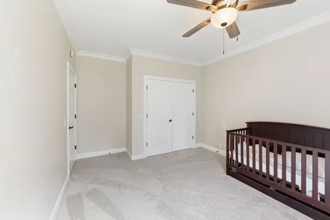 a view of a livingroom with a ceiling fan