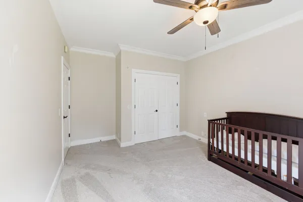 a view of a livingroom with a ceiling fan