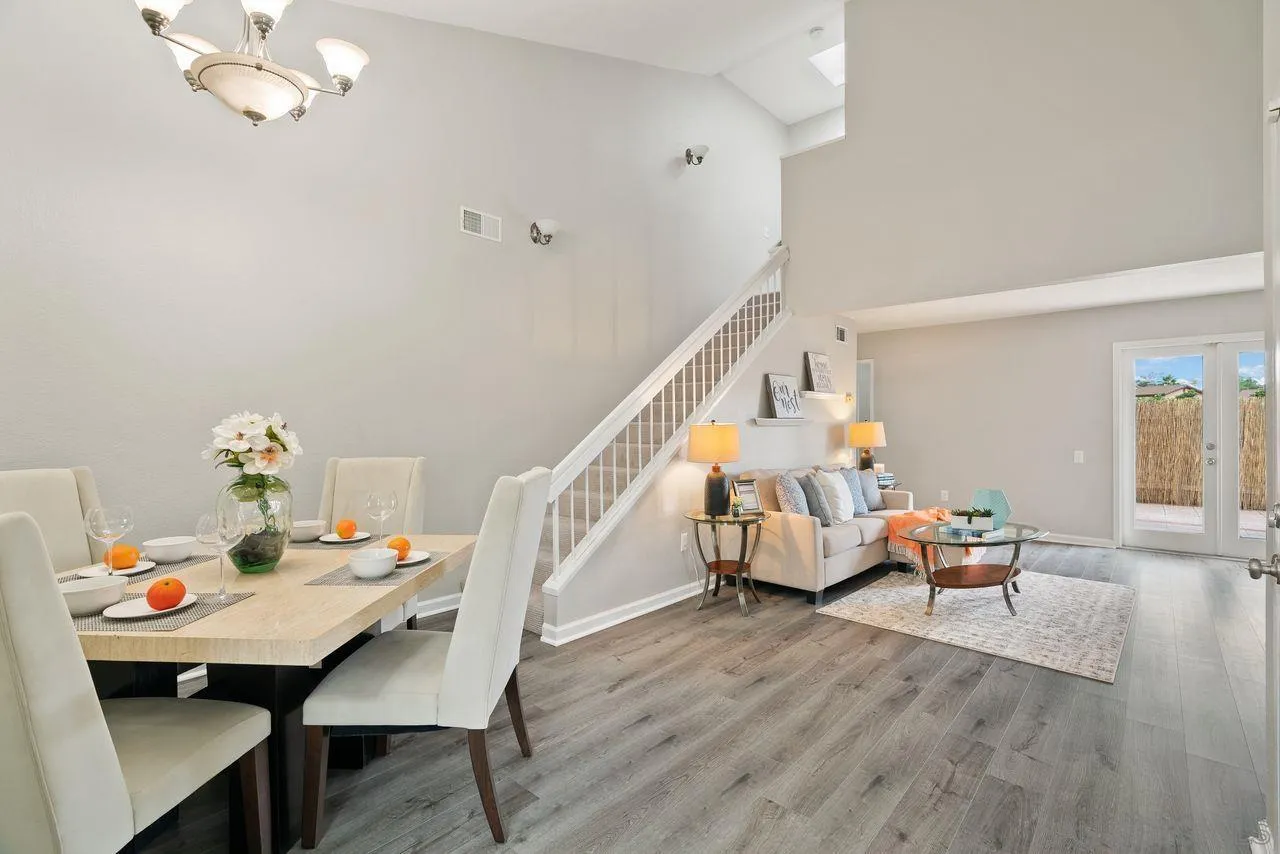 4765 Adler Way Oceanside, CA 92057 - Photo 11 of 33 a living room with furniture and wooden floor