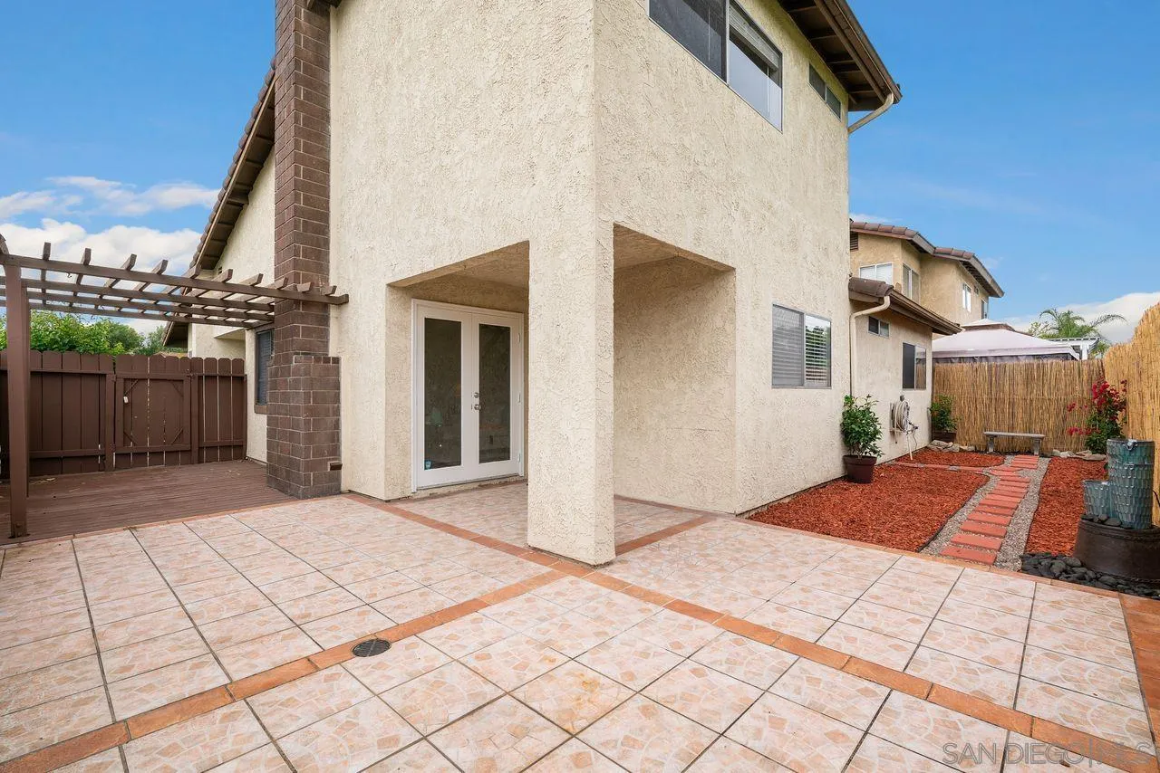 4765 Adler Way Oceanside, CA 92057 - Photo 28 of 33 a backyard of a house with lots of green space
